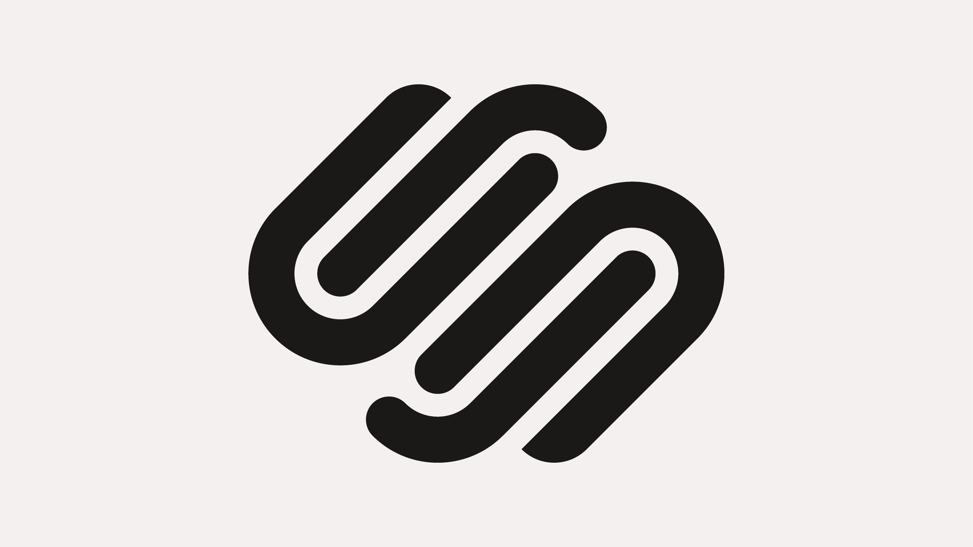 The Squarespace logo on a grey background