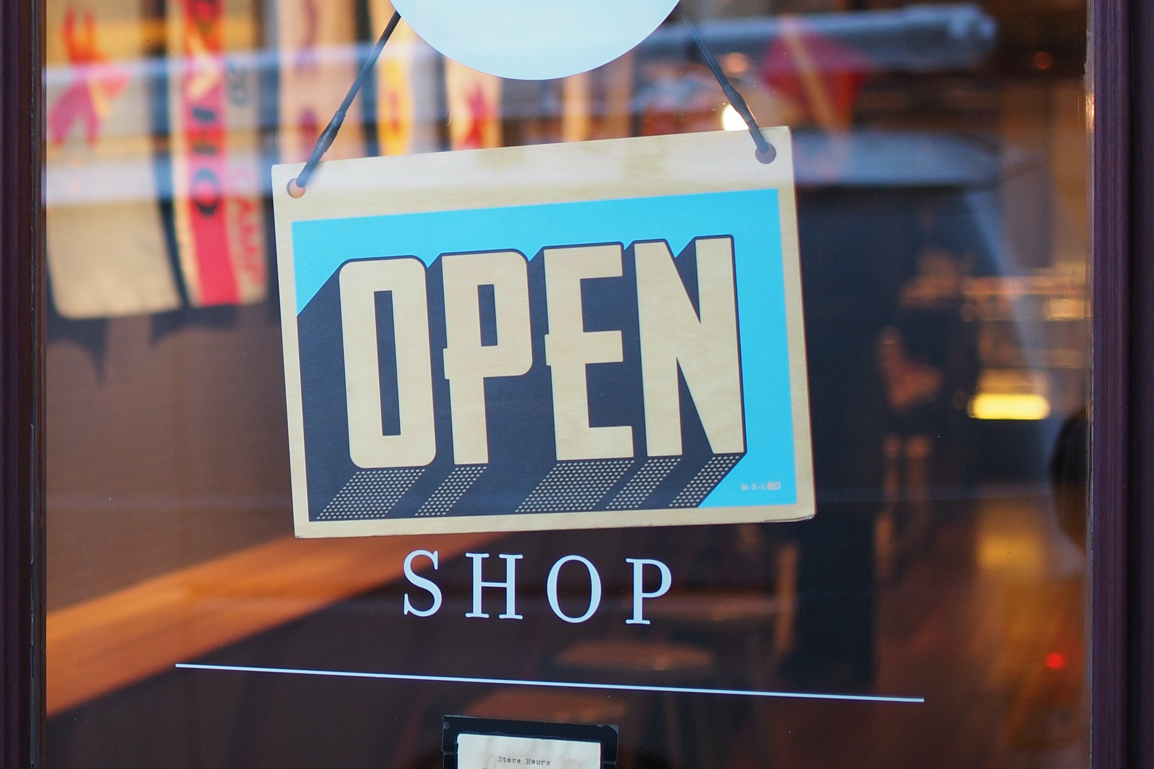 A shop window showing an open sign